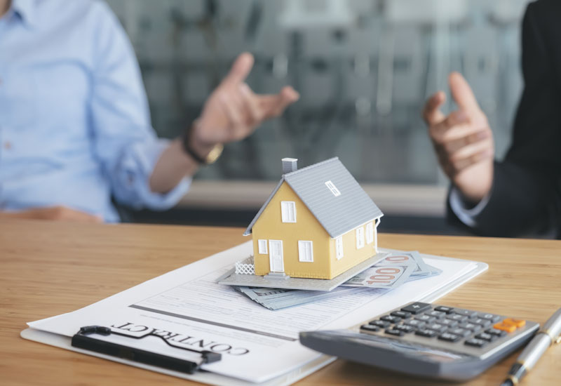 Customer signing contract for a new house.